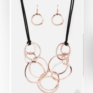 New. Shiny copper ring necklace. Soft black cord.